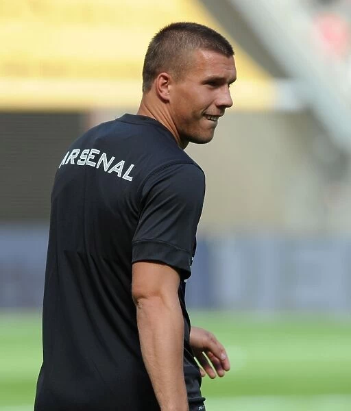 Lukas Podolski's Emotional Return: Arsenal Star Reunites with Cologne for Pre-Season Training