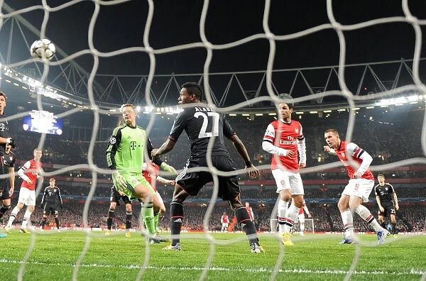 Lukas Podolski's Epic Header: Arsenal's Stunning Upset Against Bayern Munich in the Champions League (Manuel Neuer, David Alaba)
