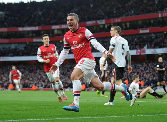 Framed Print : Lukas Podolski's FA Cup Goal Celebration: Arsenal's Second against Liverpool (2013-14)
