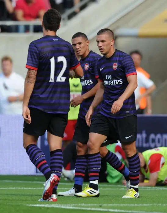 Framed Print : Lukas Podolski's Hat-Trick: Arsenal's Pre-Season Triumph Over FC Cologne (August 2012) Framed Print : Lukas Podolski's Hat-Trick: Arsenal's Pre-Season Triumph Over FC Cologne (August 2012)