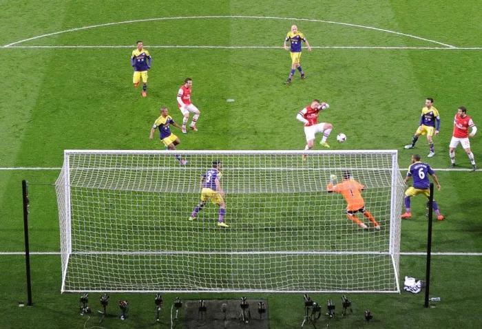 Framed Print : Lukas Podolski's Stunning Goal: Arsenal Opens Score Against Swansea City (2013-14)