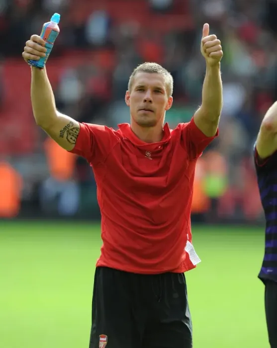 Framed Print : Lukas Podolski's Triumphant Salute: Liverpool vs. Arsenal, Premier League 2012-13 Framed Print : Lukas Podolski's Triumphant Salute: Liverpool vs. Arsenal, Premier League 2012-13
