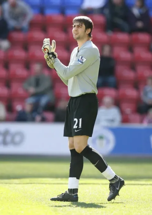 Framed Print : Lukasz Fabianski's Dominance: Arsenal Crush Wigan Athletic 4-1 in Premier League