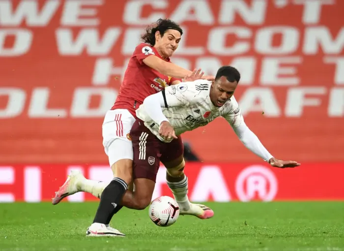 Framed Print : Magalhaes vs. Cavani: A Rivalry Restarted Amidst Pandemic Restrictions - Arsenal vs. Manchester United, 2020-21 Framed Print : Magalhaes vs. Cavani: A Rivalry Restarted Amidst Pandemic Restrictions - Arsenal vs. Manchester United, 2020-21