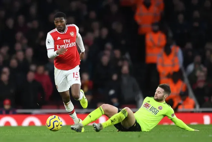 Framed Print : Maitland-Niles Outsmarts Norwood: Arsenal's Midfield Masterclass vs Sheffield United