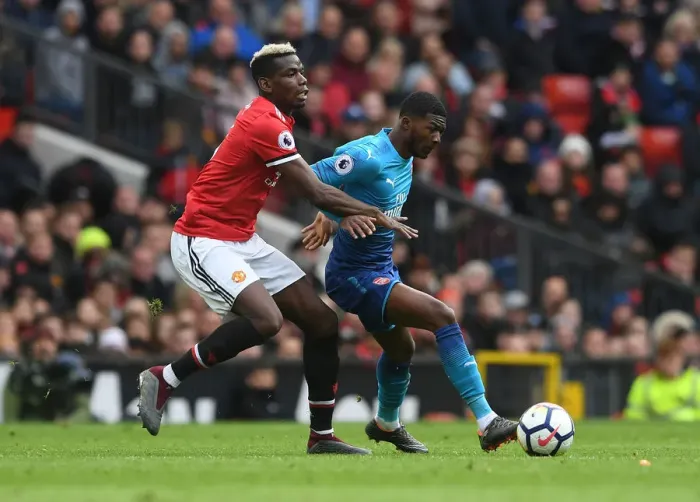 Framed Print : Maitland-Niles vs. Pogba: Clash at Old Trafford - Manchester United vs. Arsenal, Premier League 2017-18
