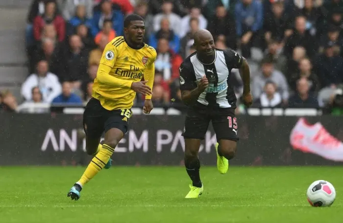 Framed Print : Maitland-Niles vs. Willems: Battle at St. James Park - Arsenal vs. Newcastle United, Premier League 2019-20