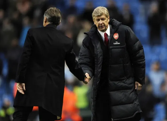 Framed Print : Managers Arsene Wenger (Arsenal) and Roberto Mancini (Man City) shake hands ast the end of the match. Manchester City 0: 3 Arsenal, Barclays Premier League, City Of Manchester Stadium, Manchester, 24  /  10  /  2010. Credit : Stuart MacFarlane  /  Arsenal