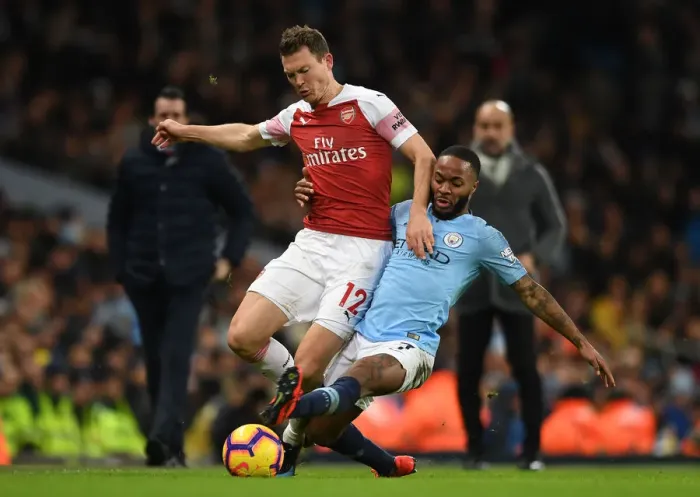 Framed Print : Manchester City vs Arsenal: Stephan Lichtsteiner Clashes with Raheem Sterling in Premier League Showdown (2018-19)