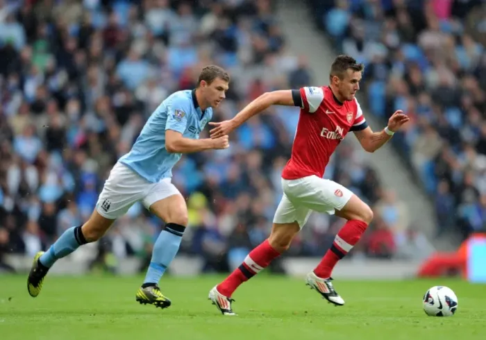 Framed Print : Manchester City vs Arsenal: Jenkinson vs Dzeko - 1-1 Stalemate in the Premier League Framed Print : Manchester City vs Arsenal: Jenkinson vs Dzeko - 1-1 Stalemate in the Premier League