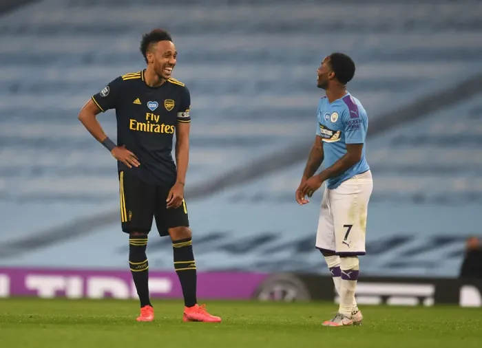 Framed Print : Manchester Derby: Aubameyang and Sterling Share a Moment Amidst Premier League Battle (Manchester City vs Arsenal, 2019-20) Framed Print : Manchester Derby: Aubameyang and Sterling Share a Moment Amidst Premier League Battle (Manchester City vs Arsenal, 2019-20)