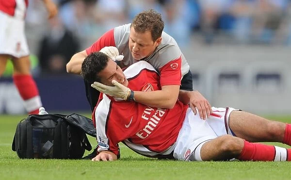 Manchester Derby Agony: Van Persie vs Adebayor Clash (2009) - Arsenal's Robin Suffers Head Injury at City's Hands