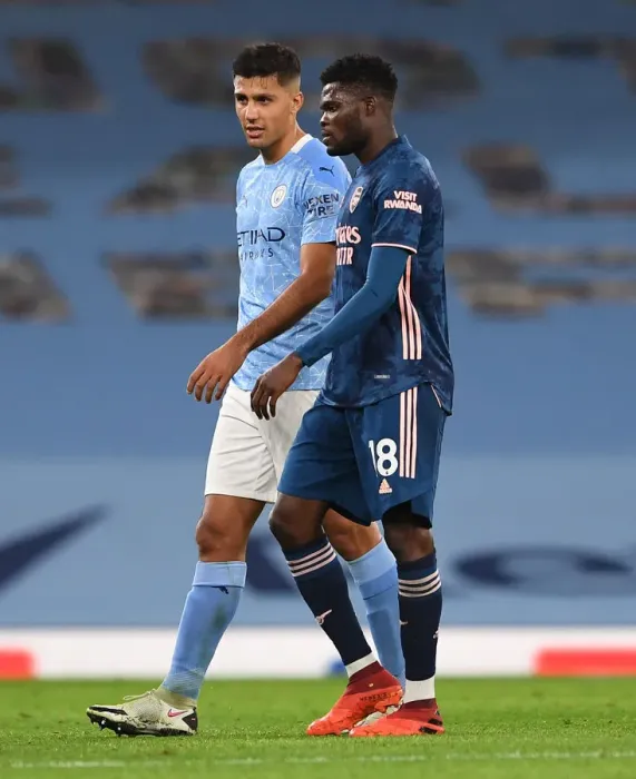 Framed Print : Manchester Derby: Thomas Partey and Rodrigo Share a Moment after Manchester City vs. Arsenal (2020-21) Framed Print : Manchester Derby: Thomas Partey and Rodrigo Share a Moment after Manchester City vs. Arsenal (2020-21)