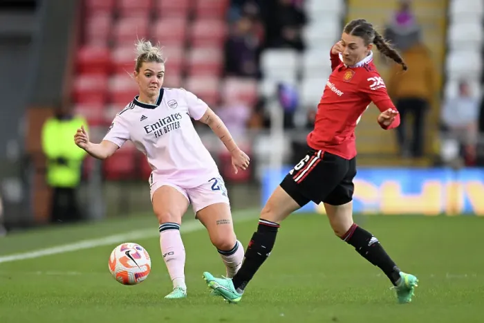 Framed Print : Manchester United vs. Arsenal: Women's Super League Clash - Arsenal's Laura Wienroither Fends Off Hannah Blundell Framed Print : Manchester United vs. Arsenal: Women's Super League Clash - Arsenal's Laura Wienroither Fends Off Hannah Blundell