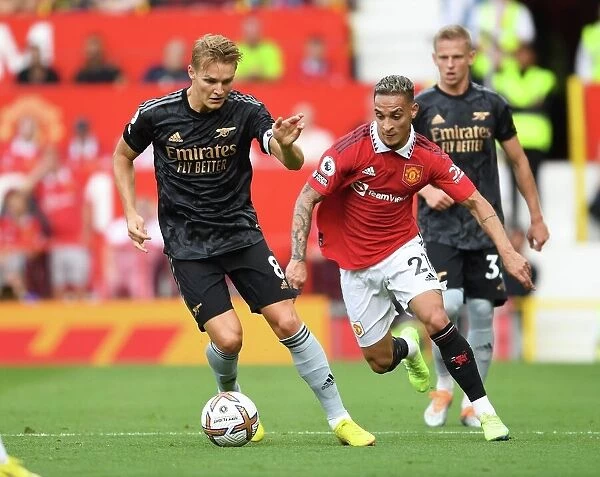 Manchester United vs Arsenal: Martin Odegaard Clashes with Antony in Premier League Showdown (2022-23)