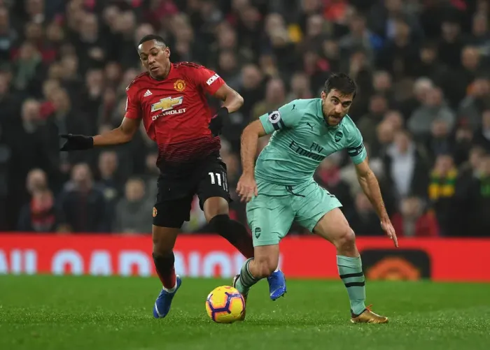 Framed Print : Manchester United vs Arsenal: Sokratis Faces Off Against Anthony Martial in Premier League Clash