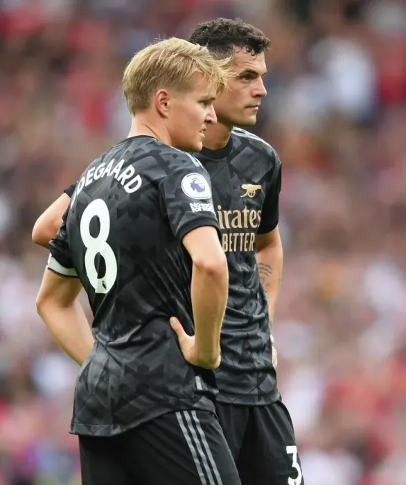 Framed Print : Manchester United vs Arsenal: Xhaka and Odegaard Face Off in Premier League Clash (2022-23) Framed Print : Manchester United vs Arsenal: Xhaka and Odegaard Face Off in Premier League Clash (2022-23)