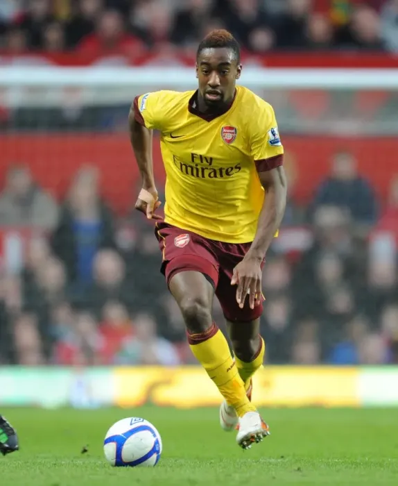 Framed Print : Manchester United's Triumph over Arsenal in FA Cup Sixth Round: Johan Djourou's Defeat at Old Trafford (2010)
