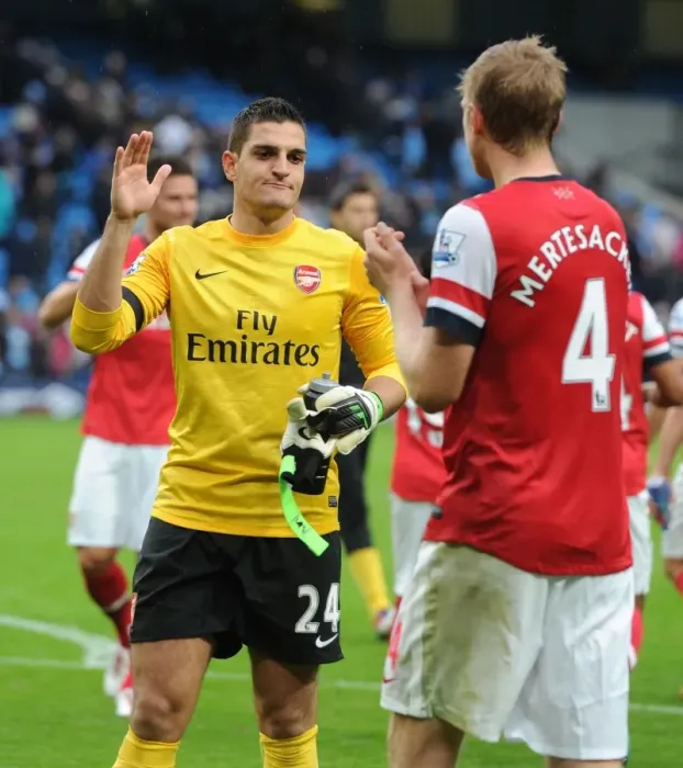 Framed Print : Mannone and Mertesacker: Arsenal's Defensive Duo After Manchester City Showdown (2012-13) Framed Print : Mannone and Mertesacker: Arsenal's Defensive Duo After Manchester City Showdown (2012-13)