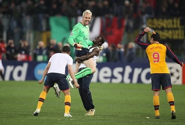 Manuel Almunia and Arsenal Team Celebrate Hard-Fought Victory Over AS Roma in UEFA Champions League