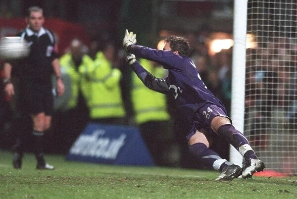 Manuel Almunia saves Doncasters 4th penalty during the penalty shoot out