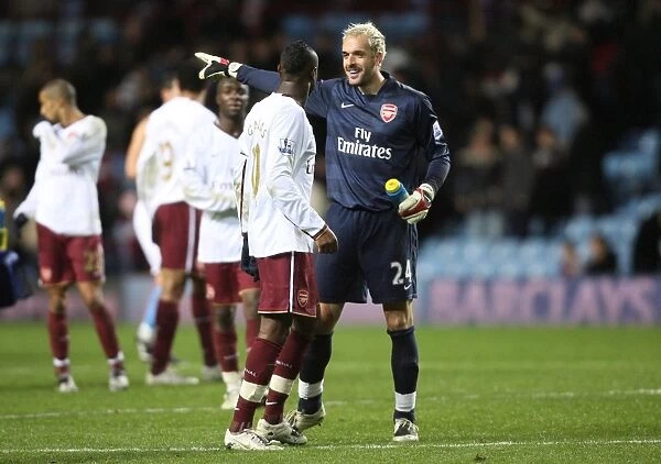 Manuel Almunia and William Gallas (Arsenal) celebrate after the match