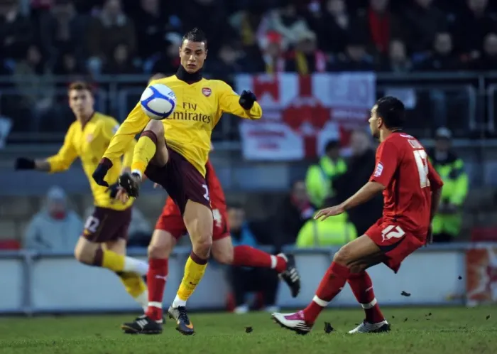 Framed Print : Marouane Chamakh (Arsenal) Jason Crowe (Orient). Leyton Orient 1: 1 Arsenal