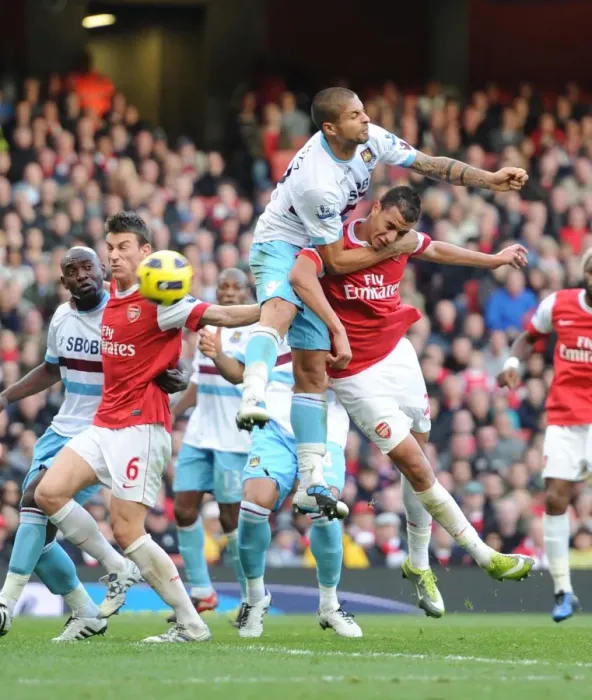 Framed Print : Marouane Chamakh (Arsenal) Manuel Da Costa (West Ham). Arsenal 1: 0 West Ham United Framed Print : Marouane Chamakh (Arsenal) Manuel Da Costa (West Ham). Arsenal 1: 0 West Ham United