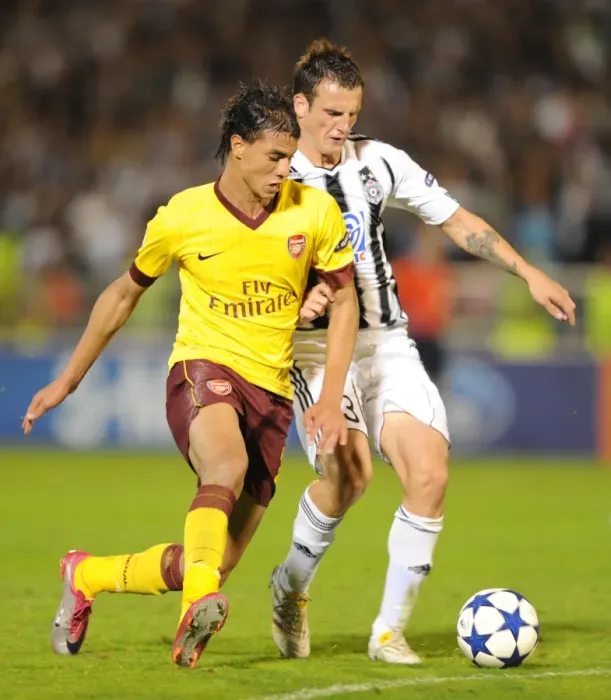 Framed Print : Marouane Chamakh (Arsenal) Marko Jovanovic (Partizan). Partizan Belgrade 1: 3 Arsenal
