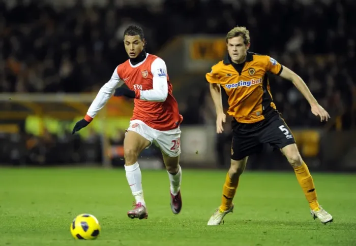 Framed Print : Marouane Chamakh (Arsenal) Richard Stearman (Wolves). Wolverhampton Wanderers 0: 2 Arsenal
