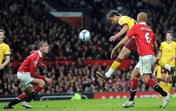 Marouane Chamakh (Arsenal) Wes Brown and Chris Smalling (Man Utd). Manchester United 2