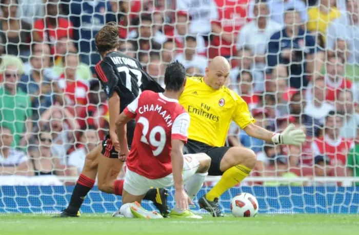 Framed Print : Marouane Chamakh beats Christian Abbiata (Milan) to score Arsenals goal