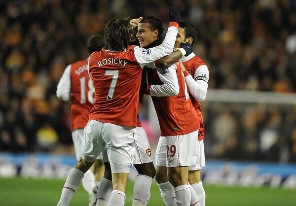 Marouane Chamakh celebrates scoring the 1st Arsenal goal with Tomas Rosicky