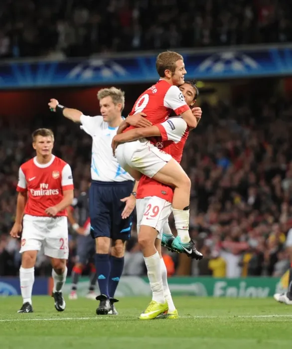 Framed Print : Marouane Chamakh celebrates scoring the 3rd Arsenal goal with Jack Wilshere