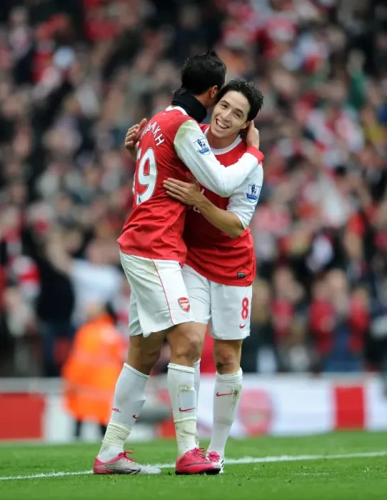 Framed Print : Marouane Chamakh celebrates scoring Arsenals 2nd goal with Samir Nasri