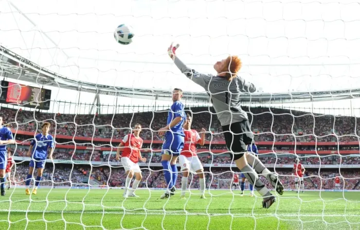 Framed Print : Marouane Chamakh heads past Bolton goalkeeper Adam Bogdan to score the 2nd Arsenal goal