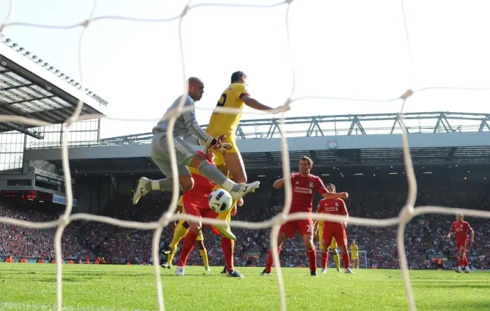 Framed Print : Marouane Chamakh jumps with Liverpool goalkeeper Pepe Reina. Liverpool 1: 1 Arsenal Framed Print : Marouane Chamakh jumps with Liverpool goalkeeper Pepe Reina. Liverpool 1: 1 Arsenal