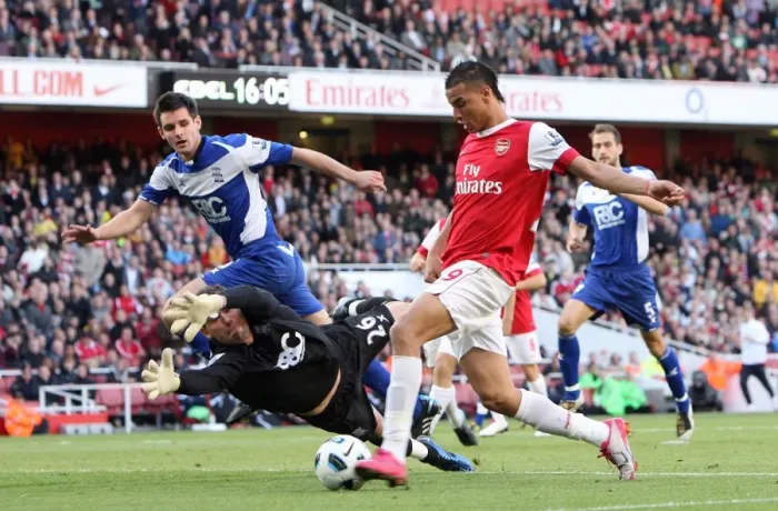 Framed Print : Marouane Chamakh scores Arsenals 2nd goal past Ben Foster and Scott Dann Framed Print : Marouane Chamakh scores Arsenals 2nd goal past Ben Foster and Scott Dann