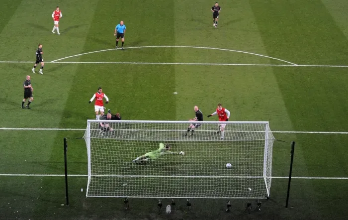 Framed Print : Marouane Chamakh shoots past Orient goalkeeper Jamie Jones to score the 1st Arsenal goal Framed Print : Marouane Chamakh shoots past Orient goalkeeper Jamie Jones to score the 1st Arsenal goal