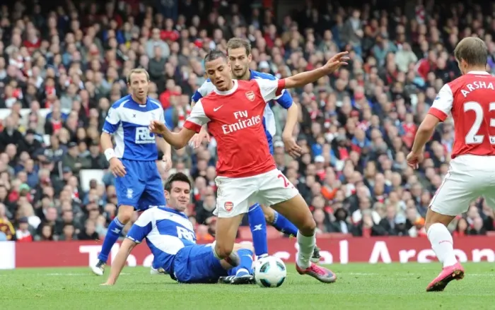 Framed Print : Marouane Chamakh is tripped by Scott Dann (Birmingham) for the Arsenal penalty Framed Print : Marouane Chamakh is tripped by Scott Dann (Birmingham) for the Arsenal penalty