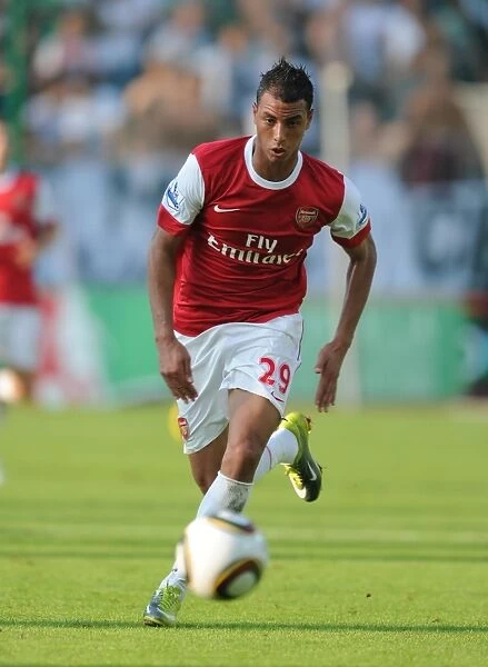 Marouane Chamakh's Hat-Trick: Arsenal Overpowers Legia Warsaw 6-5