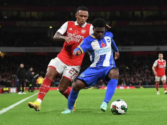 Framed Print : Marquinhos vs Lamptey: A Fierce Rivalry Unfolds in Arsenal's Carabao Cup Showdown Against Brighton
