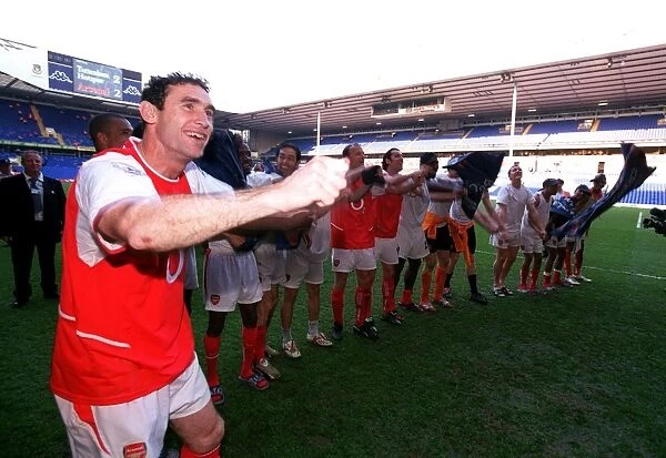 Martin Keown (Arsenal) celebrates winning the league