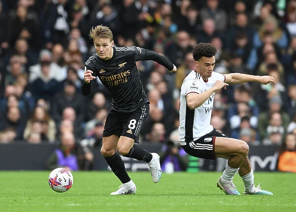 Martin Odegaard in Action: Arsenal's Midfield Maestro Shines in the Premier League Clash Against Fulham (2022-23)