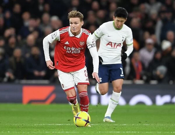 Martin Odegaard in Action: Tottenham vs. Arsenal Premier League Clash (2022-23)