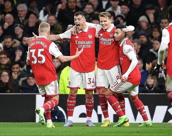 Martin Odegaard and Arsenal Team Celebrate Goals Against Tottenham Hotspur in Premier League Match, London 2023