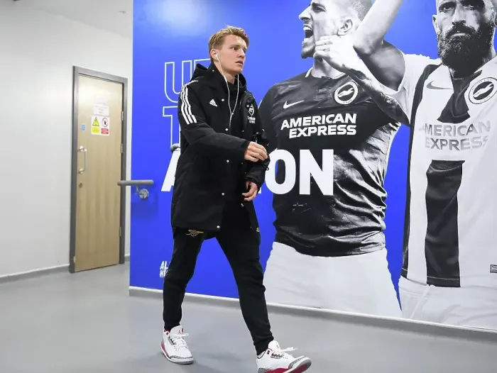 Framed Print : Martin Odegaard: Arsenal's Battle-Ready Midfielder Aims for Premier League Victory Against Brighton & Hove Albion