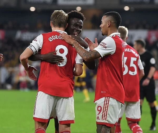 Martin Odegaard and Bukayo Saka Celebrate Arsenal's Goals Against Wolverhampton Wanderers in 2022-23 Premier League