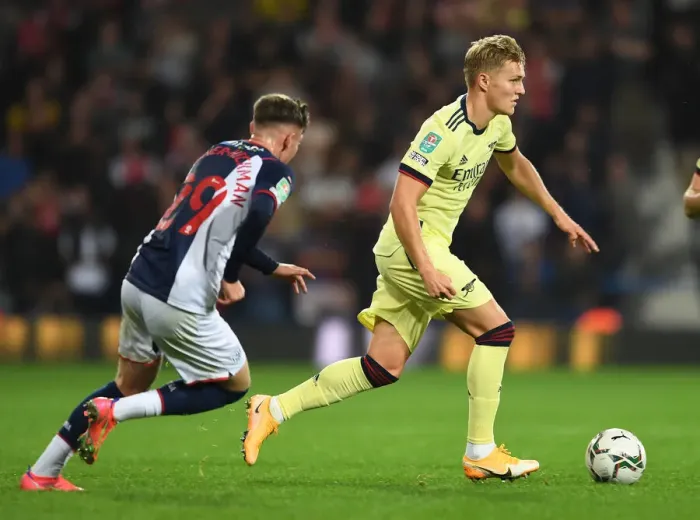 Framed Print : Martin Odegaard Clashes with Gardner-Hickman in Carabao Cup Showdown: West Bromwich Albion vs Arsenal