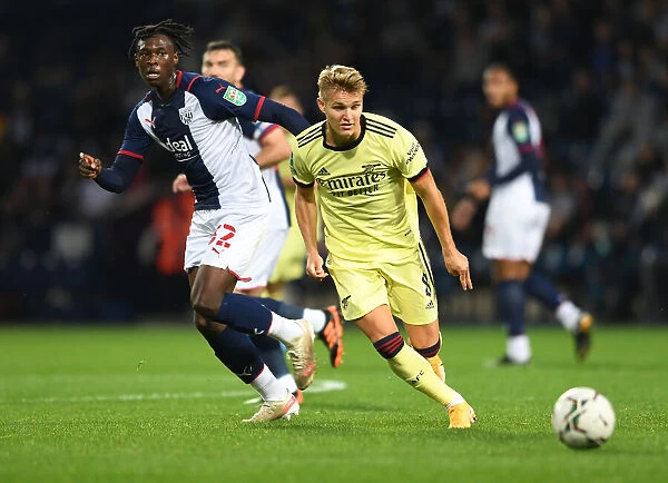 Martin Odegaard Faces Off Against Quevin Castro in Carabao Cup Clash: West Bromwich Albion vs. Arsenal